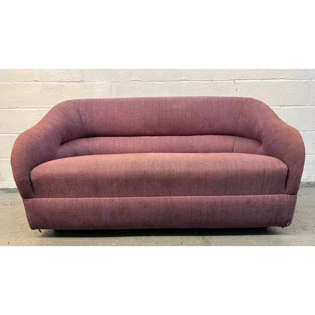 Beautiful vintage Mid-Century Modern sculptural loveseat featuring a distinctive rounded silhouette, sweeping curved arms,...