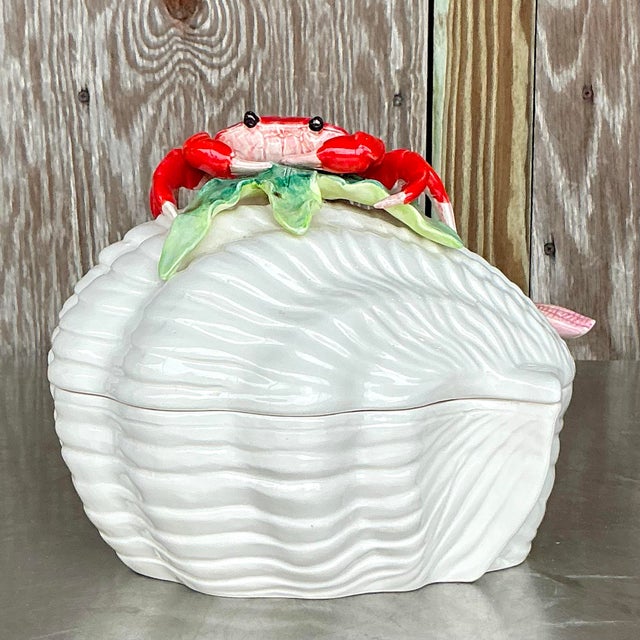Add a touch of coastal elegance to your dining experience with this vintage glazed ceramic tureen. Its beautifully crafted...