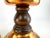 A pair of vintage Coppercraft Guild candlesticks featuring warm polished copper bodies accented with richly toned turned...