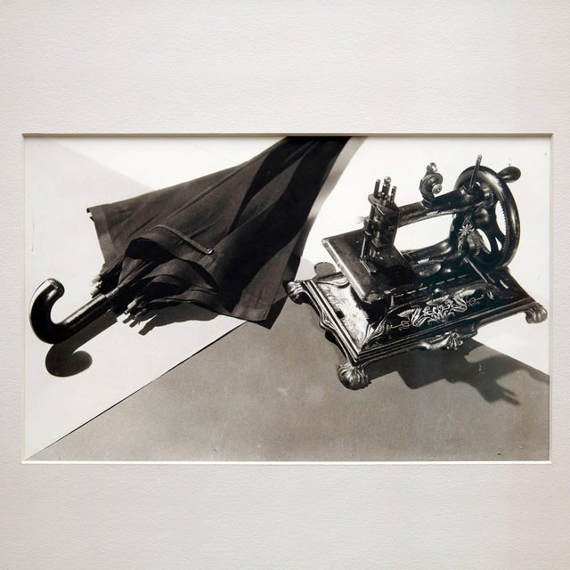 Beau comme la rencontre fortuite, sur une table de dissection, d'une machineà coudre et d'un parapluie' Photographs by Man...