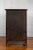 A large wedding cabinet from the 19th century, with two pairs of double doors and large butterfly hardware. This armoire...
