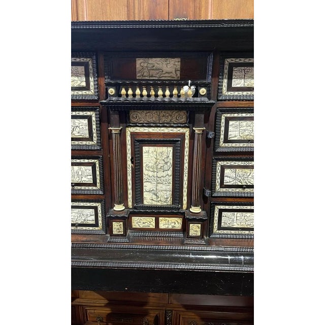 Italian counter/cabinet with trempe 19th century italian, 19th century. With ebony marquetry, ebonized wood with engraved...