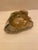 This is a vintage green stone ashtray, likely made of onyx, agate, or alabaster, with a rugged, natural-rock exterior and...