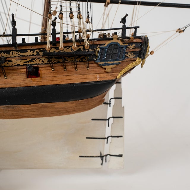An exceptional Italian hand-assembled ship model by Amati, representing the historic H.M.S. Fly, executed at a 1:64 scale...