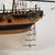 An exceptional Italian hand-assembled ship model by Amati, representing the historic H.M.S. Fly, executed at a 1:64 scale...