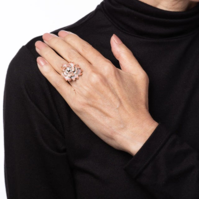 This is part of Chairish’s Fine Jewelry assortment. Stylish vintage enamel & diamond flower cocktail ring (circa 1950s to...