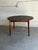 Beautiful vintage Danish Mid-Century Modern round dining table crafted in richly figured rosewood veneer with dramatic...