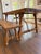 Gorgeous antique dining table with detached bench seating and all the details: bobbin-turned legs, a curved iron...