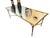 An elegant Maison Bagues style cocktail table featuring a beautifully sculptural gilded bronze organic base supporting a...