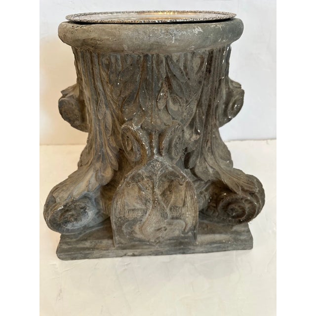 Character rich unusual drinks or occasional table having gray composite base with shield decoration. A 19th century...