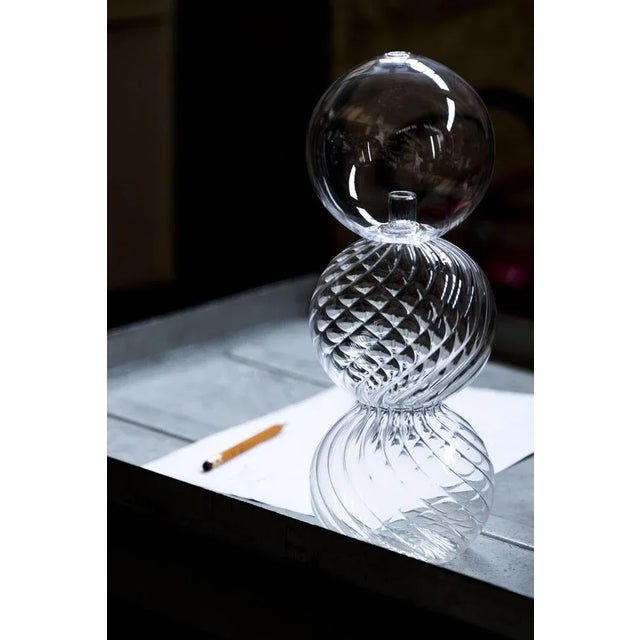 Calabaza "(a single word that stands for pumpkin/bottle in Spanish), a bottle that refers to archetypal forms obtained...