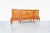 Romanian Art Deco sideboard, circa 1940s. A remarkable example of Eastern European decorative arts, this cabinet showcases...