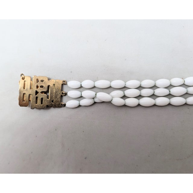 Vintage 1960s Signed Napier Goldtone & White Beaded Asian Influenced Bracelet For Sale - Image 9 of 13