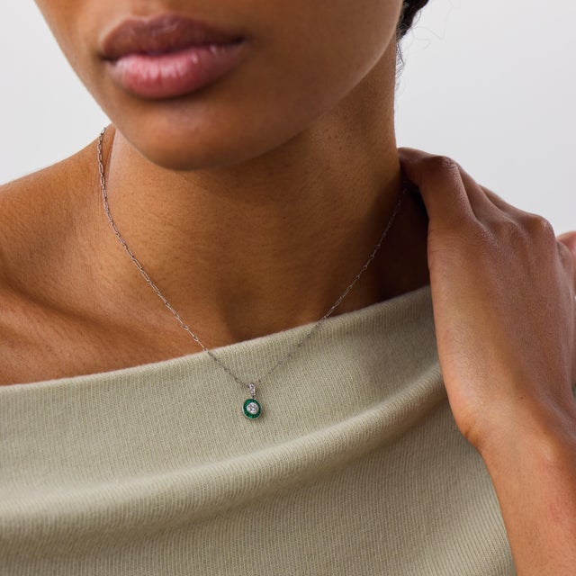 This elegant Art Deco style target pendant necklace is a beautifully geometric contemporary design, centered by a round...