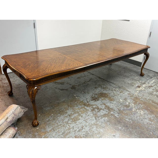 Design Plus Gallery presents a Queen Anne Style Extension Dining Set from Century Furniture. The set (Model 40305)...