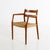 Beautiful dining chair 'Model 67' by the Danish designer Niels Möller. The 1960s design features a solid teak frame and a...