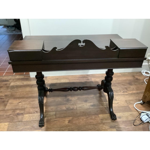 This 1800's Antique Art Nouveau Victorian Solid Walnut Desk with Carved Feet is a unique and elegant piece of furniture....