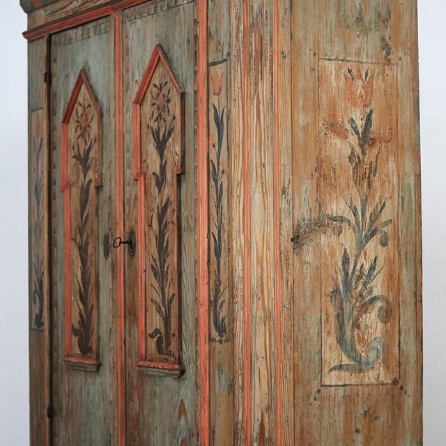 Antique folk art wedding cabinet from 1806 from Franconia, southern Germany. This cabinet has a warm appearance and enough...