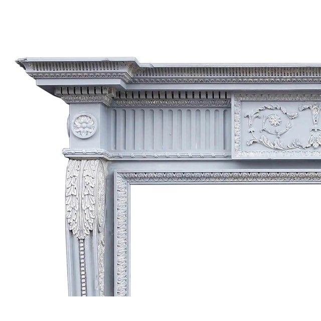 Antique, early 20th century English George I style wooden mantel of superior quality. This striking and beautifully carved...
