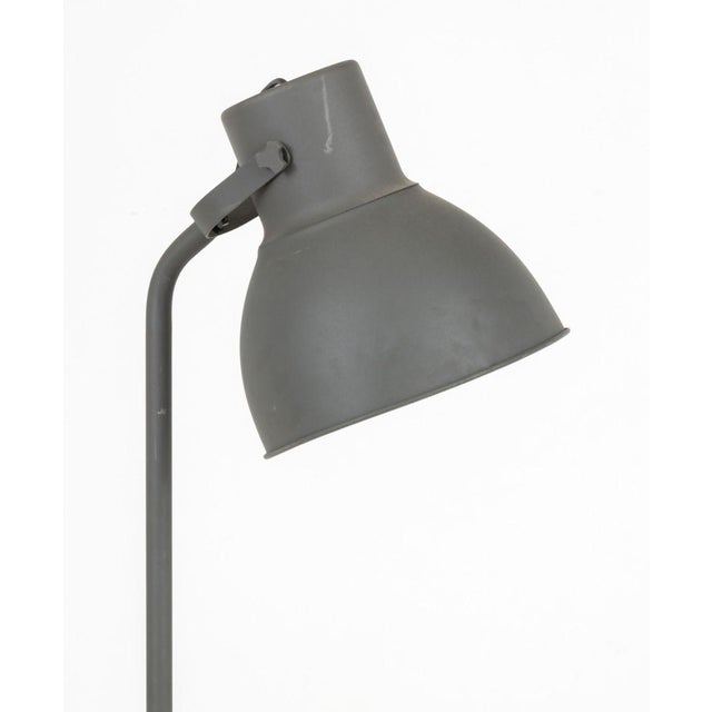 Post-Industrialist Aluminum Floor Lamp, with articulated shade mounted on steel support and circular base, Intertek label...