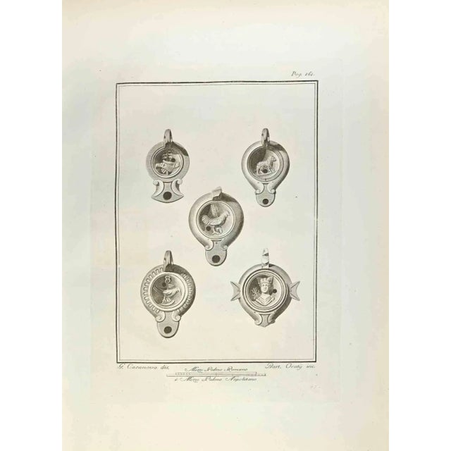 Oil Lamp with Hermes God and Birds from "Antiquities of Herculaneum" is an etching on paper realized by Carlo Oraty in the...