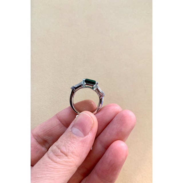A classic, Cocktail ring 5.5 Carat Emerald and Diamond Ring, Estate. 18 Karat White Gold 12 Gm Diamonds: approximate 1.5...