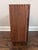 Charming vintage Karoff tabletop mini bar cabinet in richly toned walnut wood, designed with a clever pull-out drawer that...