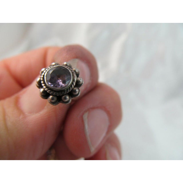 These 1950s Southwestern Amethyst and Sterling Petit Point Stud Earrings are small but mighty and pack a punch! The...
