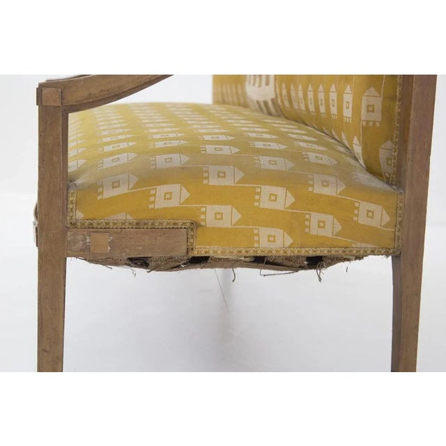 The sofa was designed in the 1950s for fine Italian craftsmanship. It is upholstered in the original fabric. The structure...