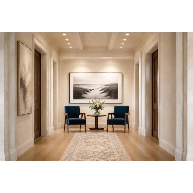 This pair of Brazilian modern armchairs from the 1950s balances architectural clarity with exceptional comfort. The open...