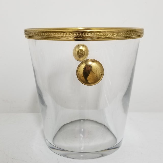 Elegant and timeless, this mid-century French champagne bucket pairs crystal-clear glass with warm brass trim for a look...