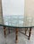 An exceptional large circular dining or center table by McGuire, circa 1980. Stout, heavy steel frame construction...
