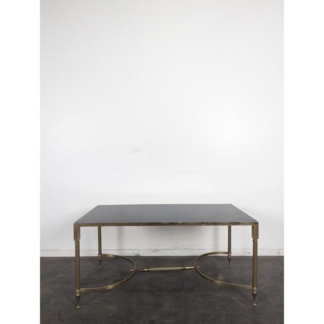 Neoclassical Coffee Table in Brass and Black Glass, 1960s, in Very Good conditions. Designed 1960 to 1969