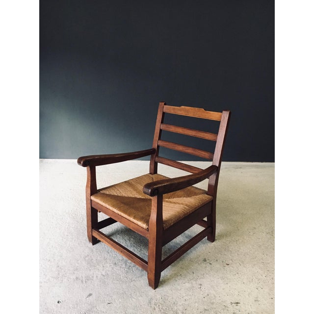 Vintage Rustic Solid Design XL Oak & Rush Arm Lounge Chair. Made in France, 1930's period. Solid oak constructed and...
