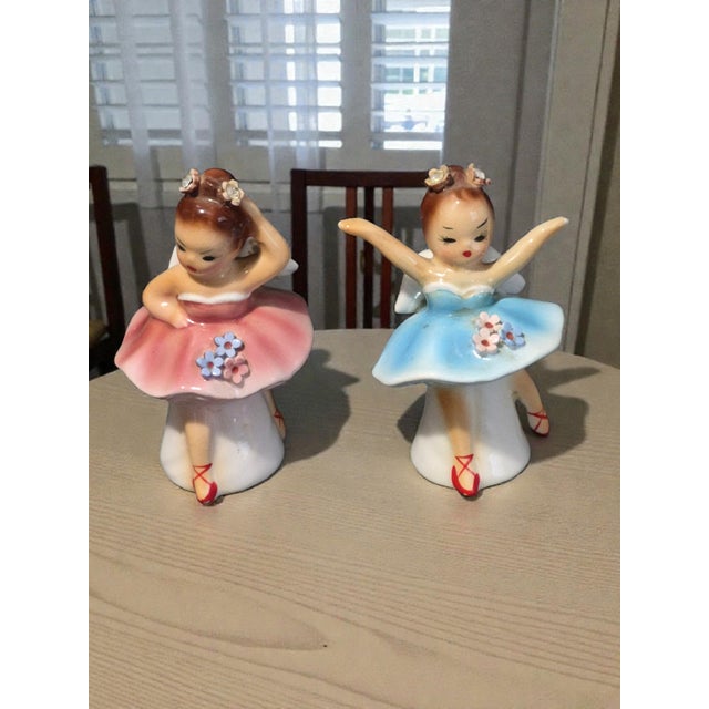 The Vintage Figural Ballerina Angel Salt & Pepper Shakers are a charming set made in Japan in the 1950s. The shakers...
