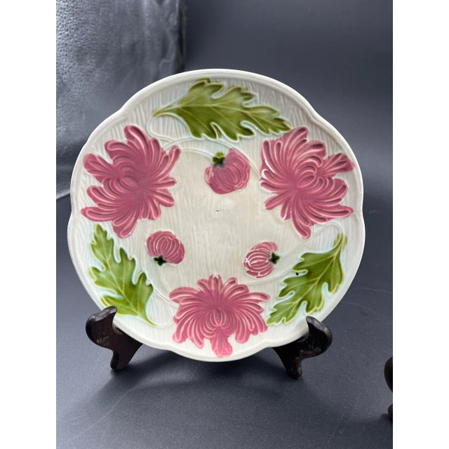 Beautiful pair of German Majolica Pink Chrysanthemum plates with buds & green leaves. High Relief flowers. A noble plant....