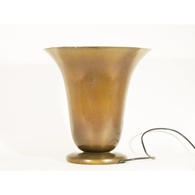 This unusual table luminator was produced in Italy around 1930s during the rationalist period. It is made from painted and...