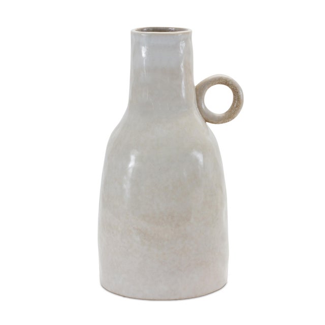 Add a rustic yet modern touch to your home with our Ceramic Jug Vase. Standing at 11.25"H, this vase features a timeless...