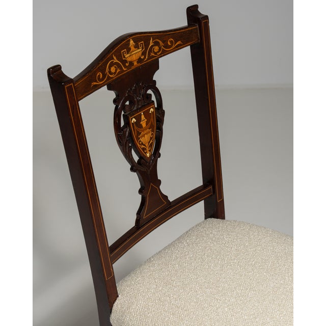 Originating from 19th-century Britain, this distinguished Victorian mahogany accent chair embodies the era's devotion to...