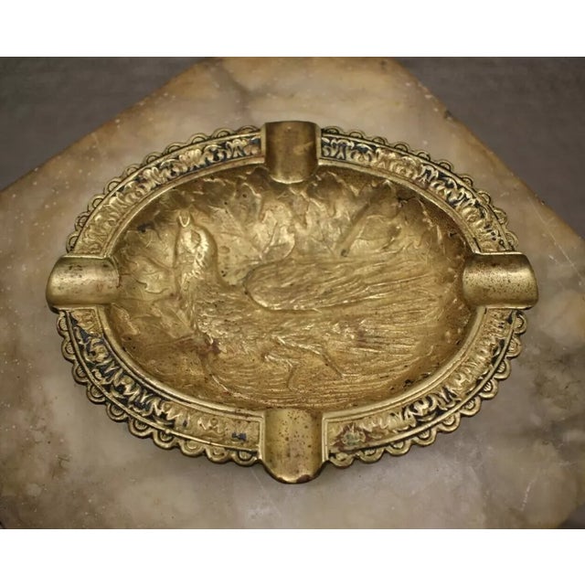 Beautiful 19th Century Solid Bronze Ashtray bird lying on leaves design . This listing is for an antique bronze cigar or...