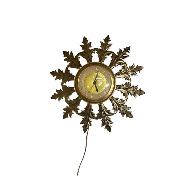 We have for your consideration a very beautiful vintage brass plated glass clock by untied. Clock is in working condition...