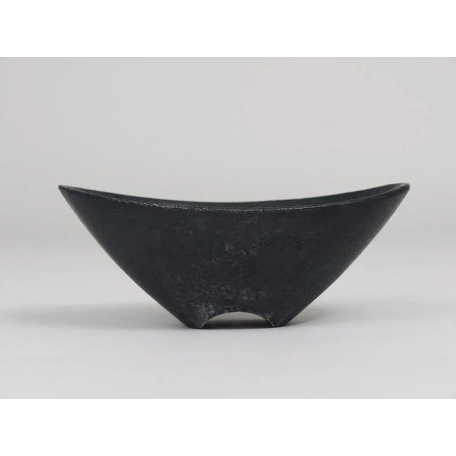 A beautiful modernist metal bowl or ashtray, made of grey or black cast iron from the 1950s. Designed and manufactured by...