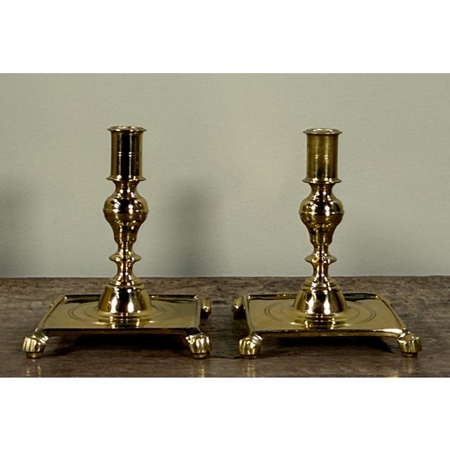 This pair of solid brass candlesticks was manufactured by Virginia Metalcrafters for Colonial Williamsburg. The...