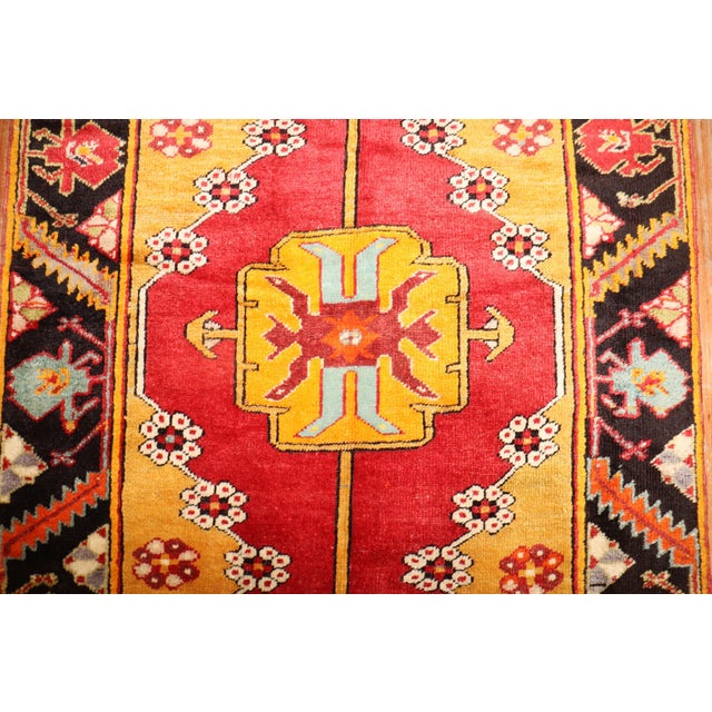 An early 20th century rich vibrant color turkish karapinar runner. Measures: 3'2'' x 13'.