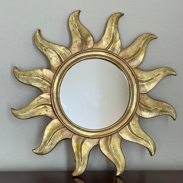 Offering a beautiful late-20th century sunburst wall mirror. This mirror was acquired at a brocante shop in Antwerp,...