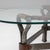 This 1950s French Brutalist glass coffee table by Jacques Adnet embodies the designers signature balance of rigor,...