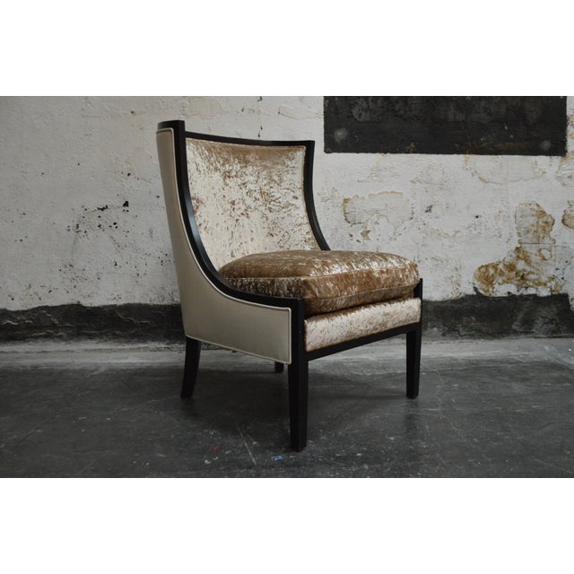 Unused showroom Sample accent chair with crushed velvet front and leather back.