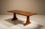 A rare and sculptural dining table attributed to the Italian architect Filippo Monti, this set captures the spirit of...