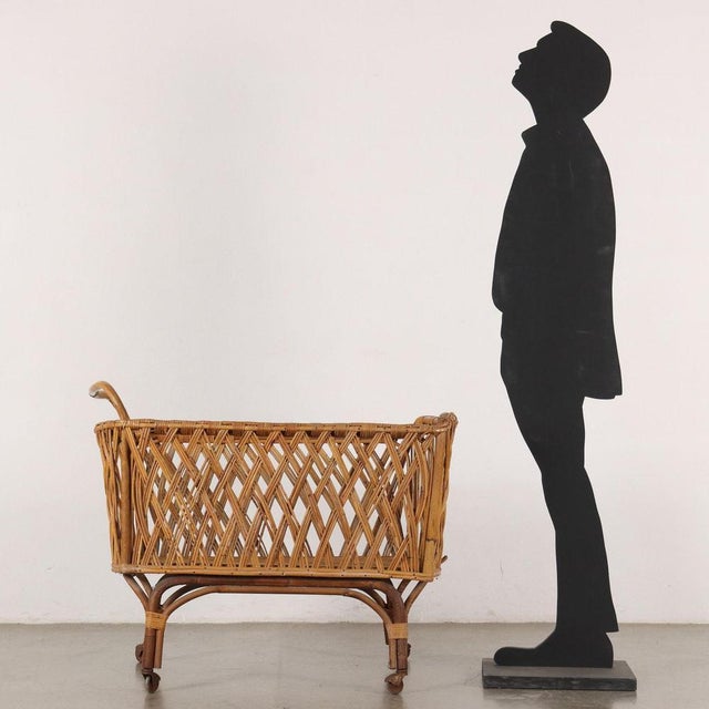 Vintage Bamboo Cradle, Italy, 1960s, in Good conditions. This piece is attributed to the mentioned designer/maker. It has...