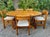Bring timeless Scandinavian style to your dining area with this vintage Danish modern dining set. Featuring a solid wood...
